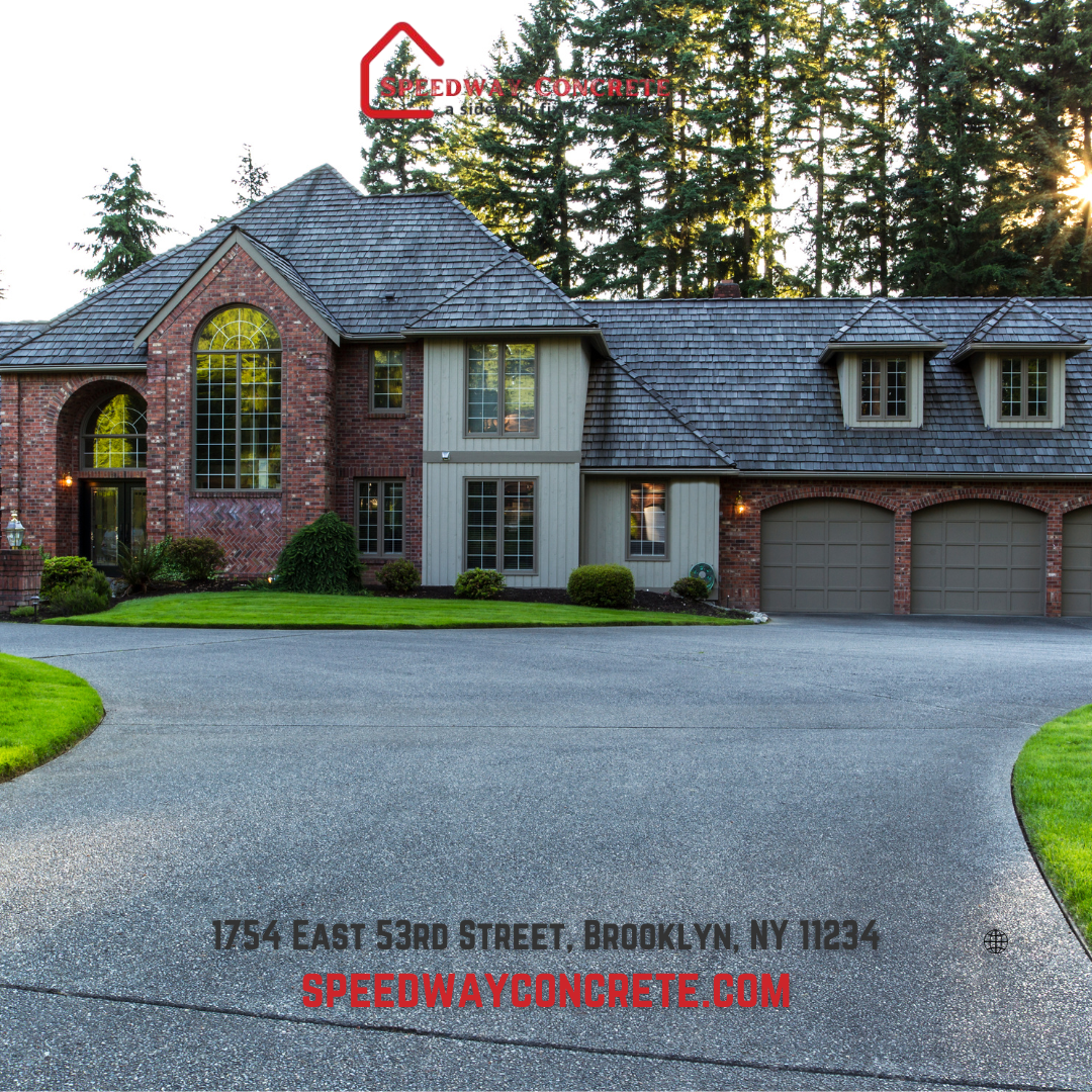 Worker sealing cracks in a concrete driveway in Brooklyn, NY