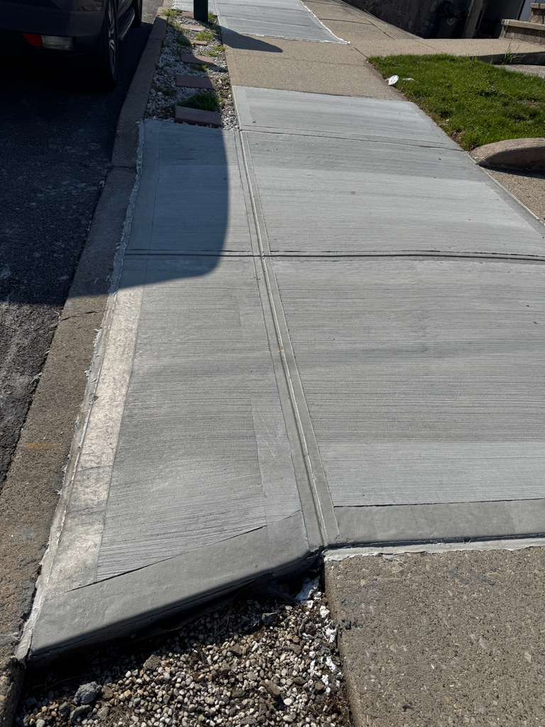 Concrete repair services in Brooklyn NY with before and after sidewalk repair